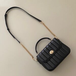Coach black top handle crossbody bag